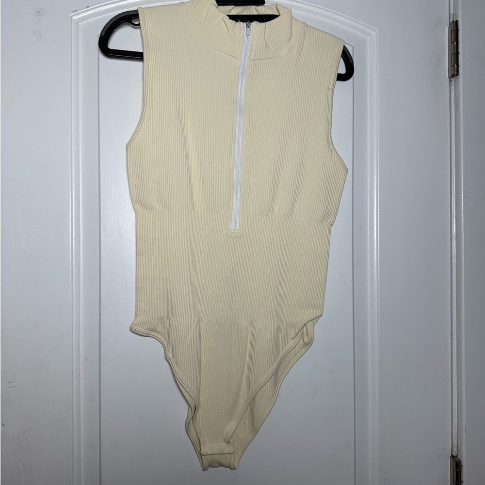 OQQ Cream Sleeveless 1/4 Zip up Bodysuit